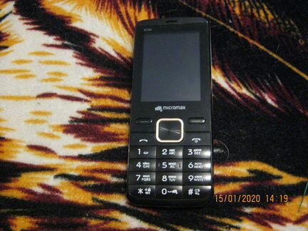 Телефон micromax X 704
