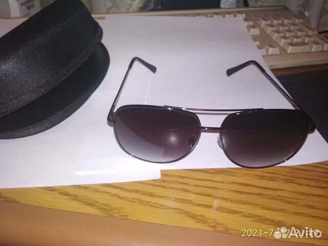 Солнцезащитные очки мужские в кейсе