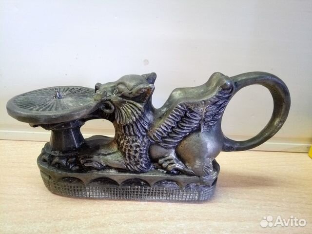 Подсвечник лев