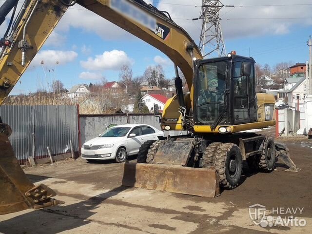 Колёсный экскаватор Caterpillar M315D 2013