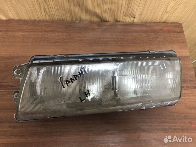 Фара левая Mitsubishi Galant E3