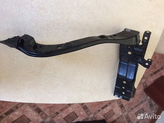 Супорт фары правый Toyota Camry V50