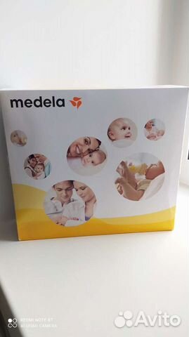 Молокоотсос medela электрический