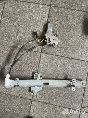 Стеклоподъемник передний левый Kia Spectra