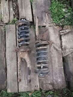 Стойка передняя левая правая Kia Sportage 1