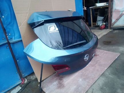 Крышка багажника Opel Astra J GTC