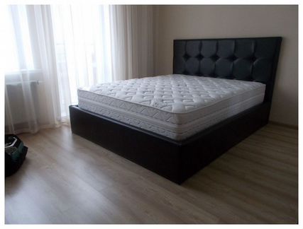 Кровать с подъемным механизмом