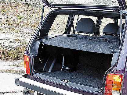 Установка на заднюю дверь нивы 2121 амортизаторы. Ваз 2131 экспедиционная. Багажник на ниву 2131. Багажник нивы 2131 внутри. Органайзер в багажник нива 21213.