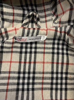 Стёганная куртка в клетку на девочку 116