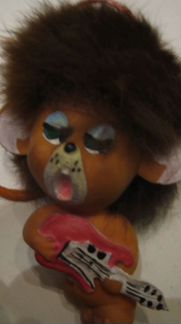 Львенок- музыкант на присоске, сувенирная игрушка